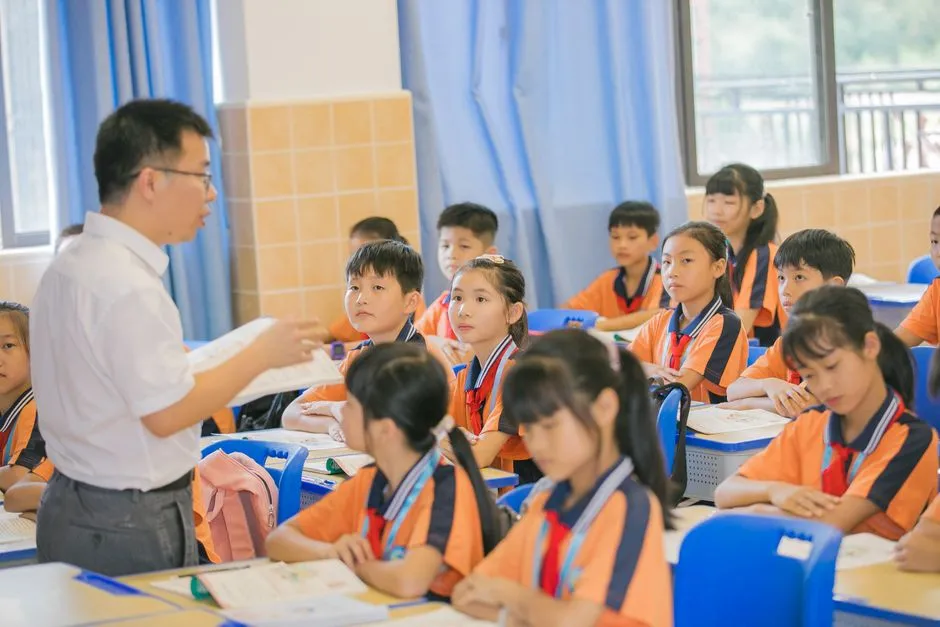 Young children reading together in a classroom